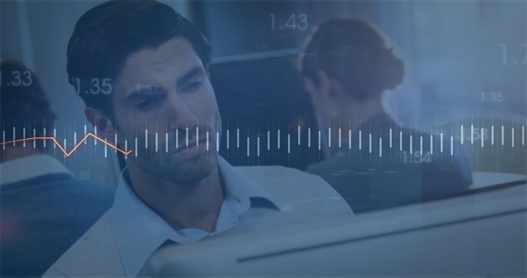 Focused Professional Reviewing Live Data with Waveform Overlay