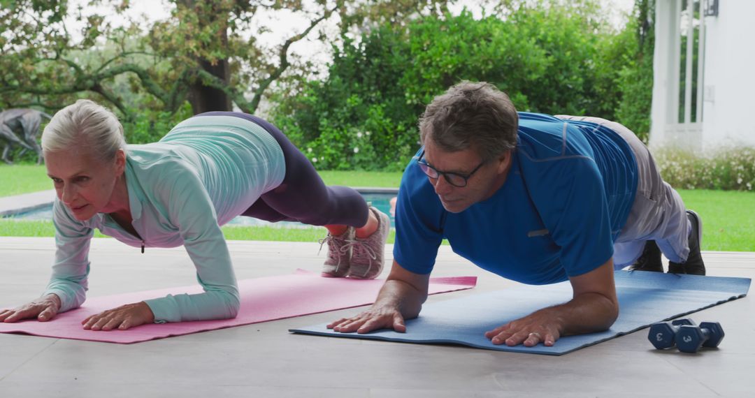 Active Seniors Exercising Together on Yoga Mats Outdoors - Free Images, Stock Photos and Pictures on Pikwizard.com