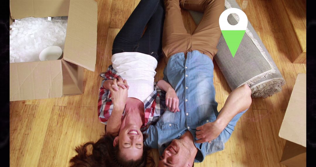 Smiling Couple Relaxing During House Move with Overlay Icons