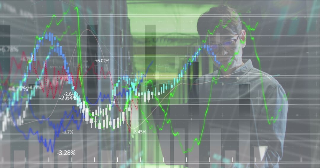 Asian Businessman Analyzing Data in Modern Server Room