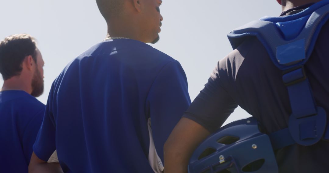 Team of diverse baseball players standing for anthem on field with copy space - Free Images, Stock Photos and Pictures on Pikwizard.com