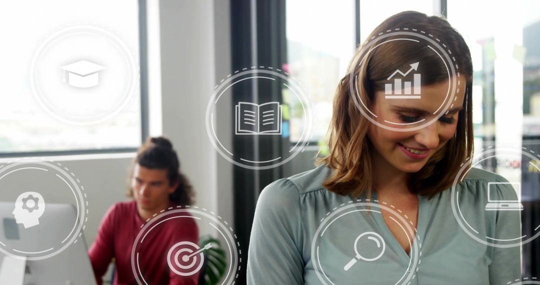 Smiling woman working in open-plan office surrounded by collaboration and digital icons