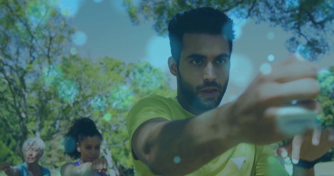 Dynamic Outdoor Fitness Class in Leafy Park Setting