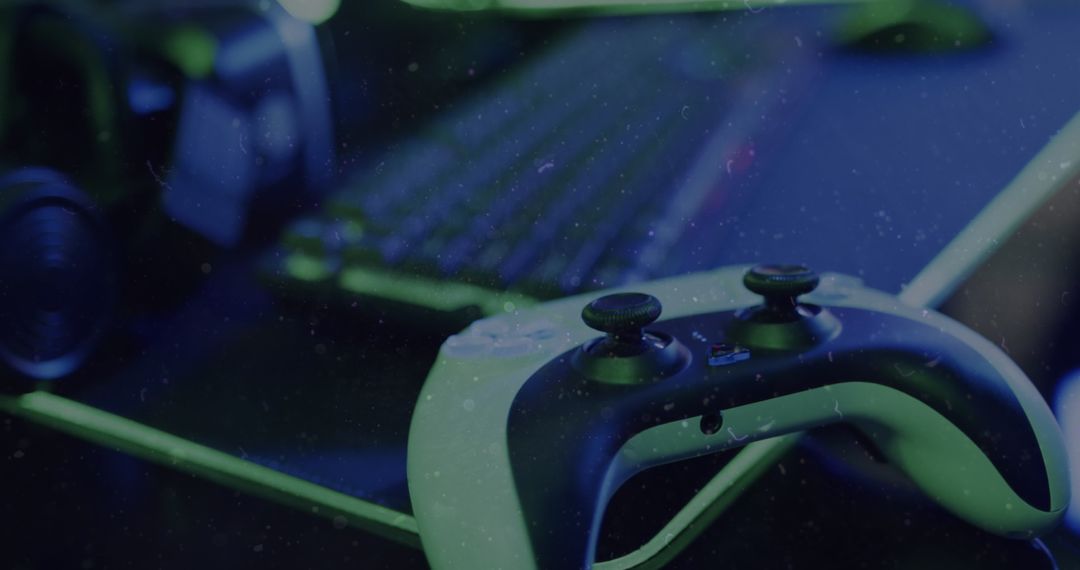 Modern Gaming Controller with Keyboard in Background