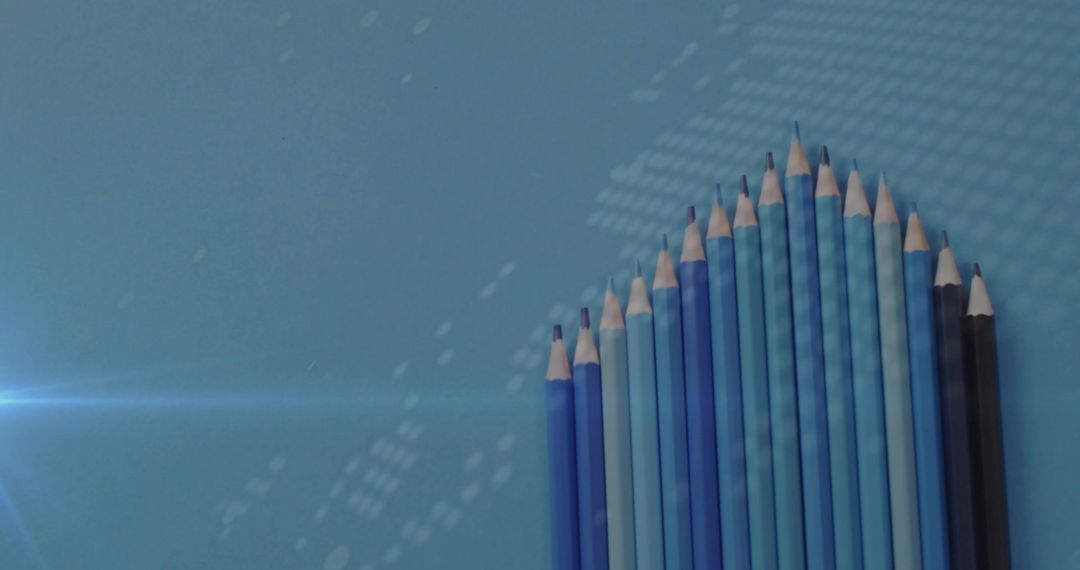 Creative Composition of Blue Pencils on Textured Surface