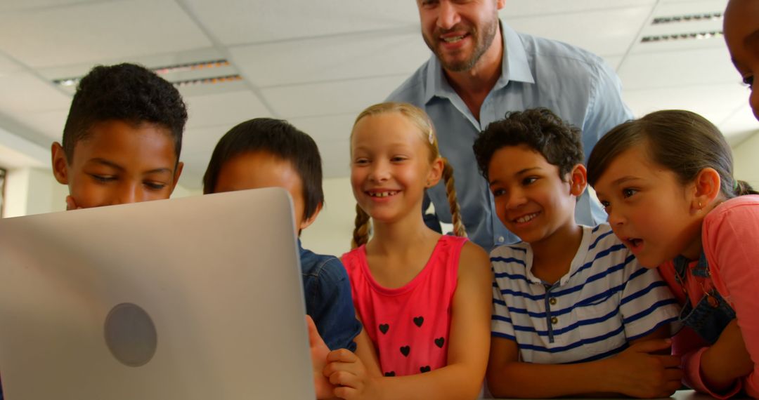 Diverse Classroom with Enthusiastic Teacher Guiding Students