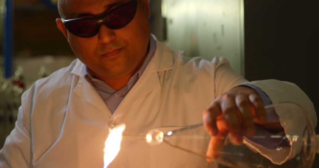 Scientist Conducting Chemical Experiment with Protective Gear - Free Images, Stock Photos and Pictures on Pikwizard.com