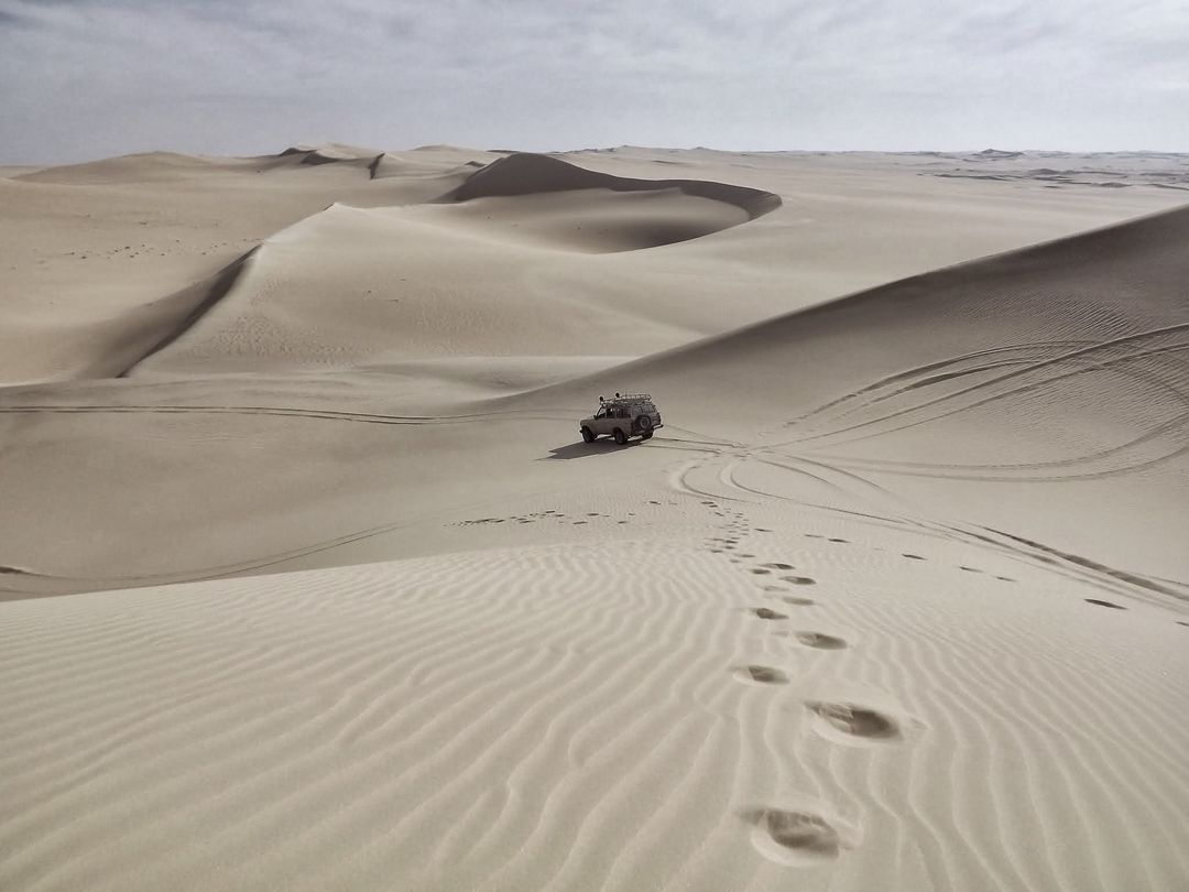 Off-Road Adventure Through Expansive Desert Dunes