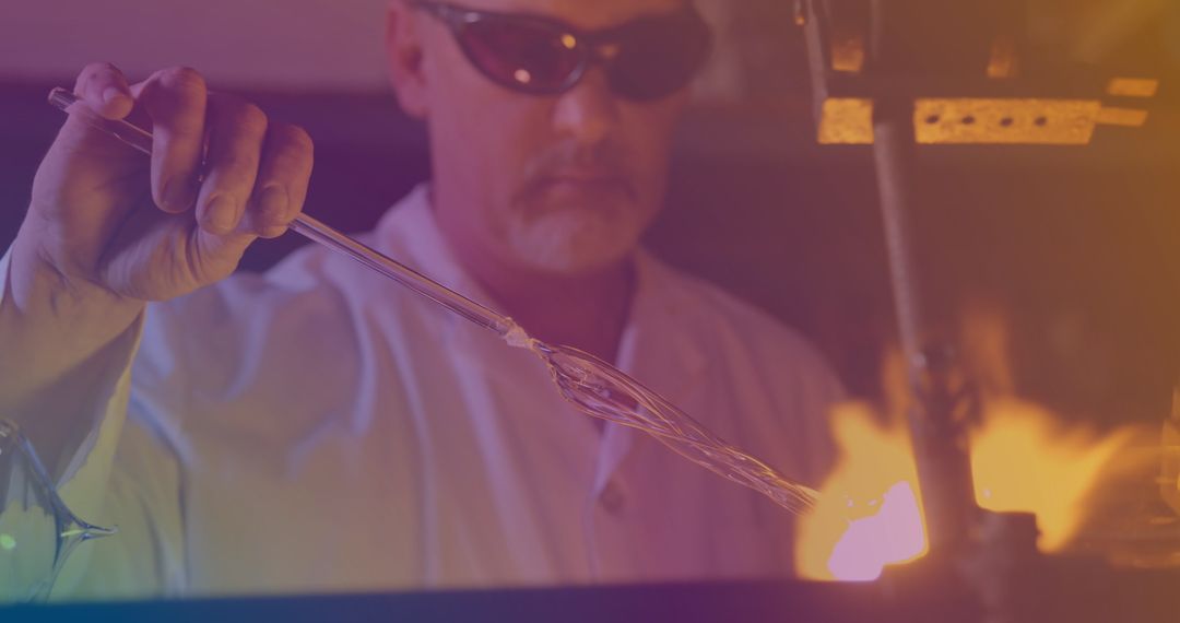 Glass Blowing Craftsman skillfully Shaping Molten Glass