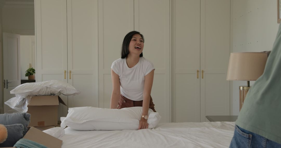 Happy Couple Enjoying Fresh Start Unpacking Boxes in Their New Home