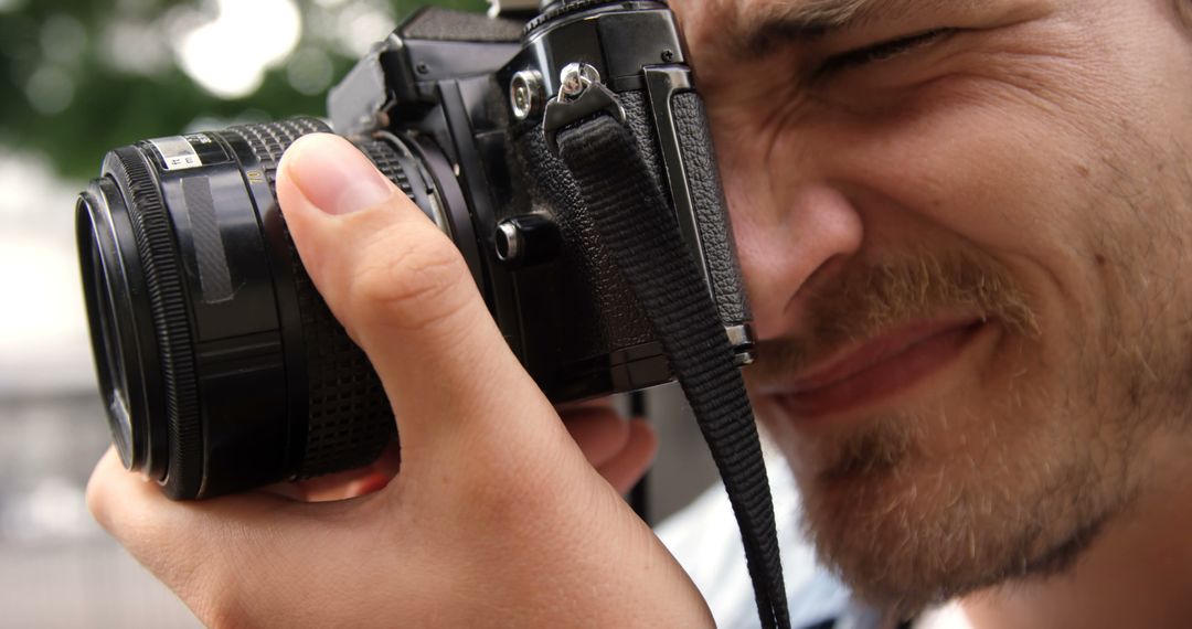 Close-Up of Man Taking Photo with Camera - Free Images, Stock Photos and Pictures on Pikwizard.com