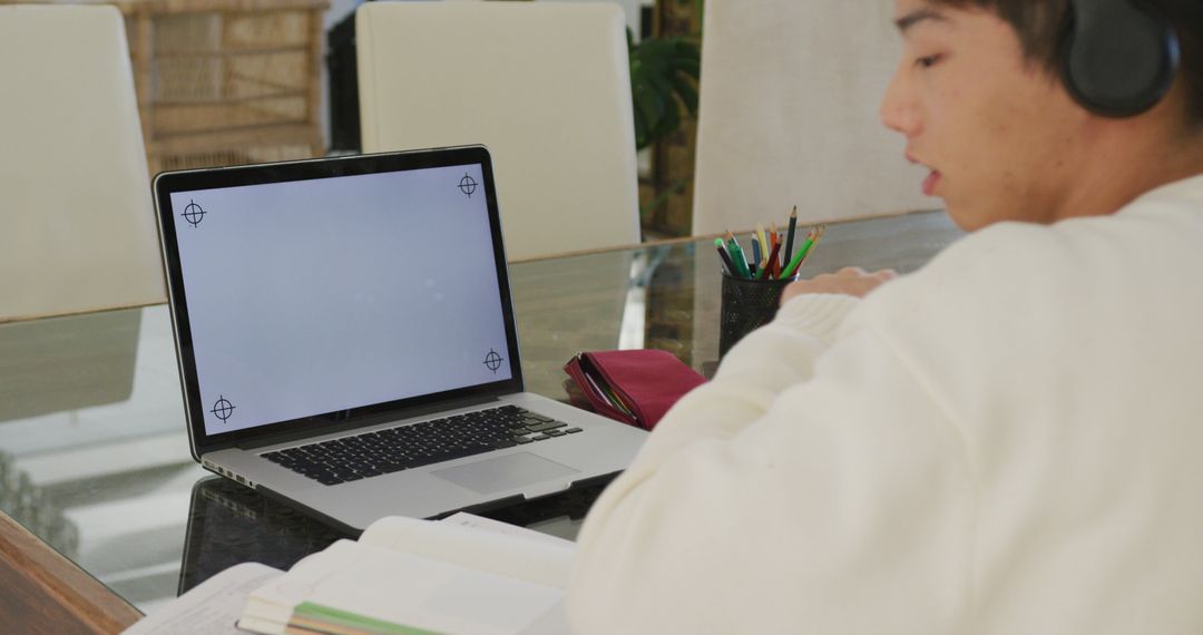 Student Using Laptop for Online Learning at Home - Free Images, Stock Photos and Pictures on Pikwizard.com