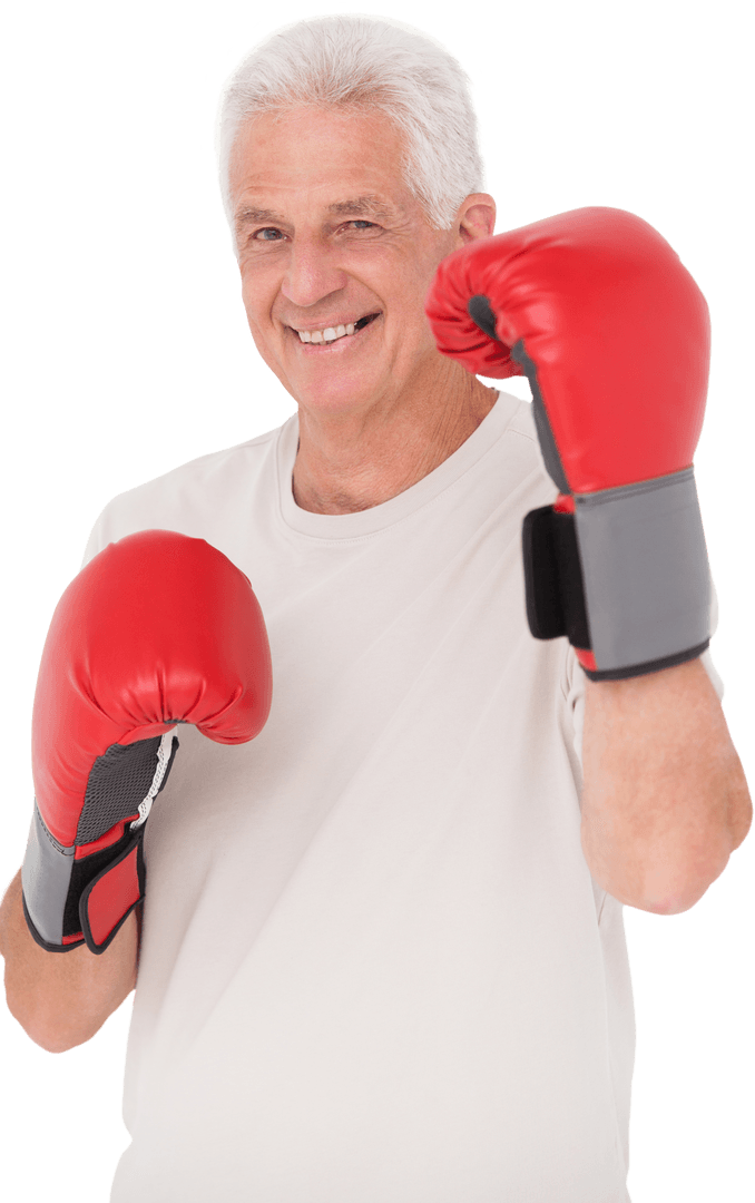 Senior Man Wearing Boxing Gloves Engaging in Fitness Routine Transparent