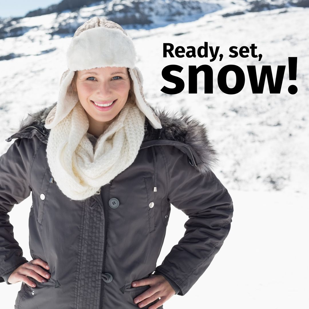 Smiling Woman in Winter Gear with Snowy Mountain
