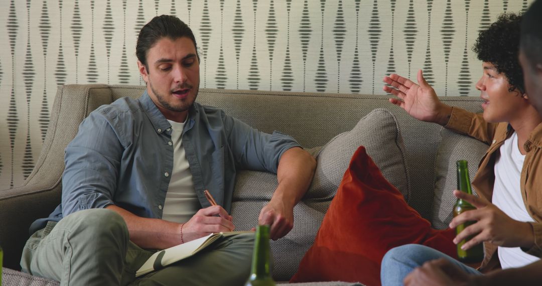 Young Adults Having Fun and Relaxing on Sofa at Casual Home Hangout