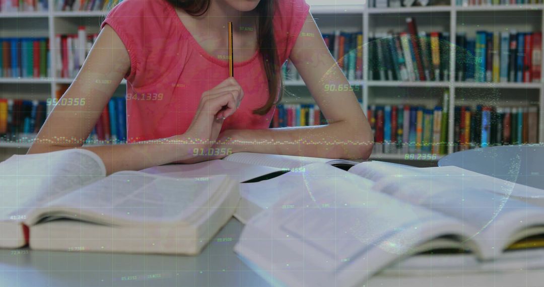 Teenage Girl Deep in Study at Library with Textbooks