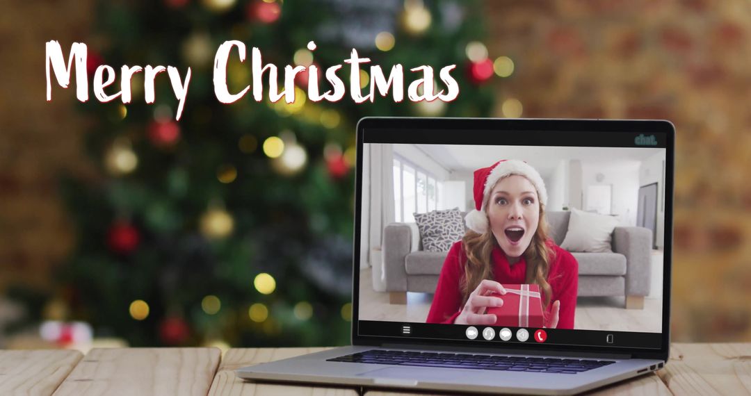 Virtual Christmas Celebration: Excited Caucasian Woman on Video Call with Gift - Free Images, Stock Photos and Pictures on Pikwizard.com