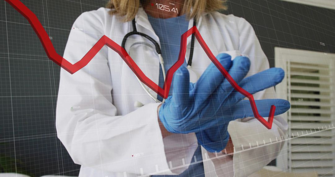Doctor donning blue gloves with falling red chart overlay illustrating clinical decline