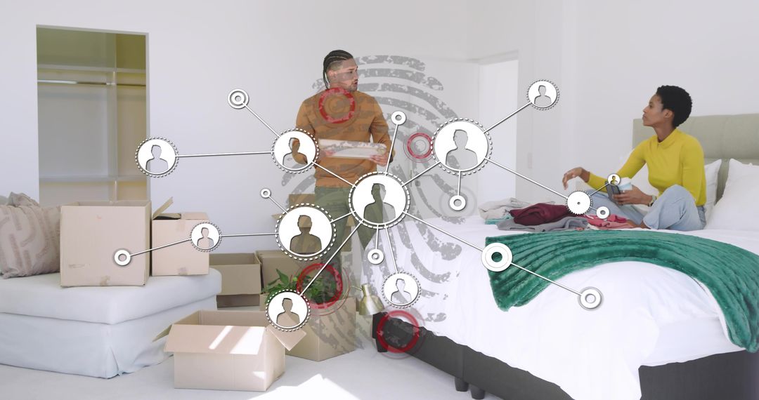 Couple unpacking boxes during move with digital network overlay showing home connectivity
