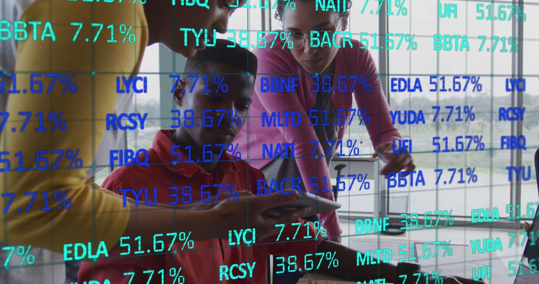 Diverse Business Team Analyzing Financial Data in Modern Office Setting