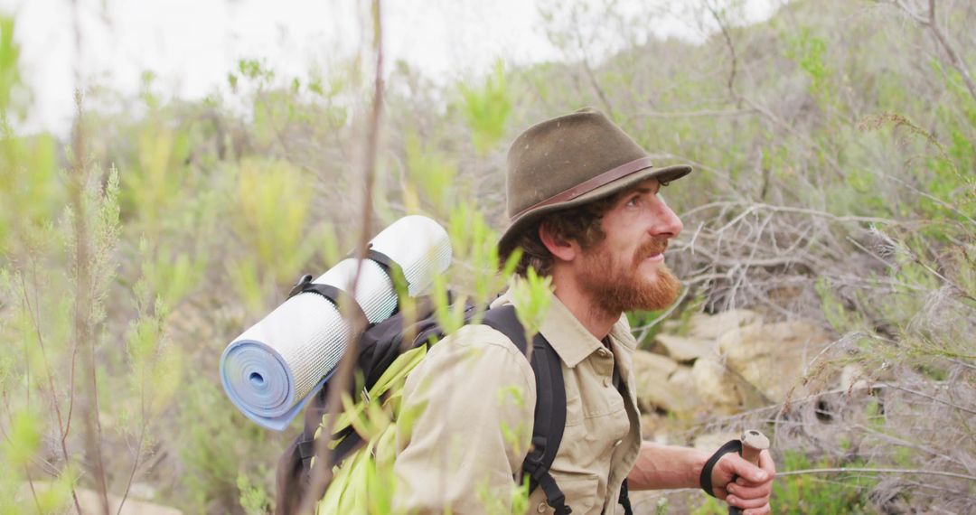 Bearded Hiker Exploring Rough Scrubland