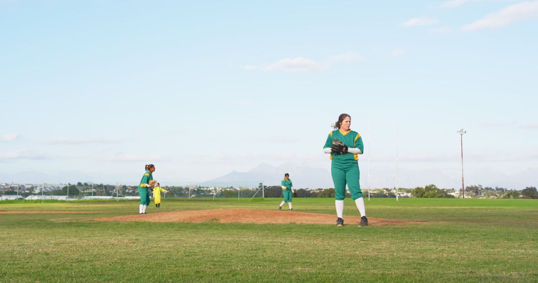 Female Softball Pitcher Displaying Skill on Mound