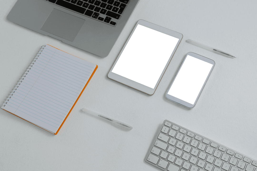 Transparent Office Desk Setup with Devices and Notepad - Download Free Stock Images Pikwizard.com