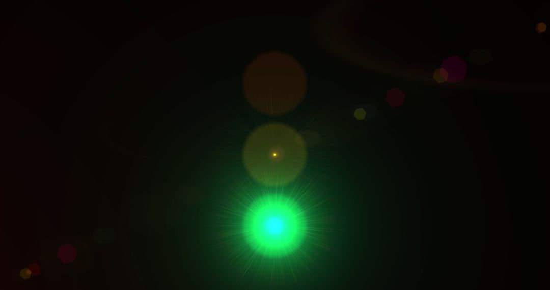 Abstract Light Spheres of Yellow and Red on Black Background