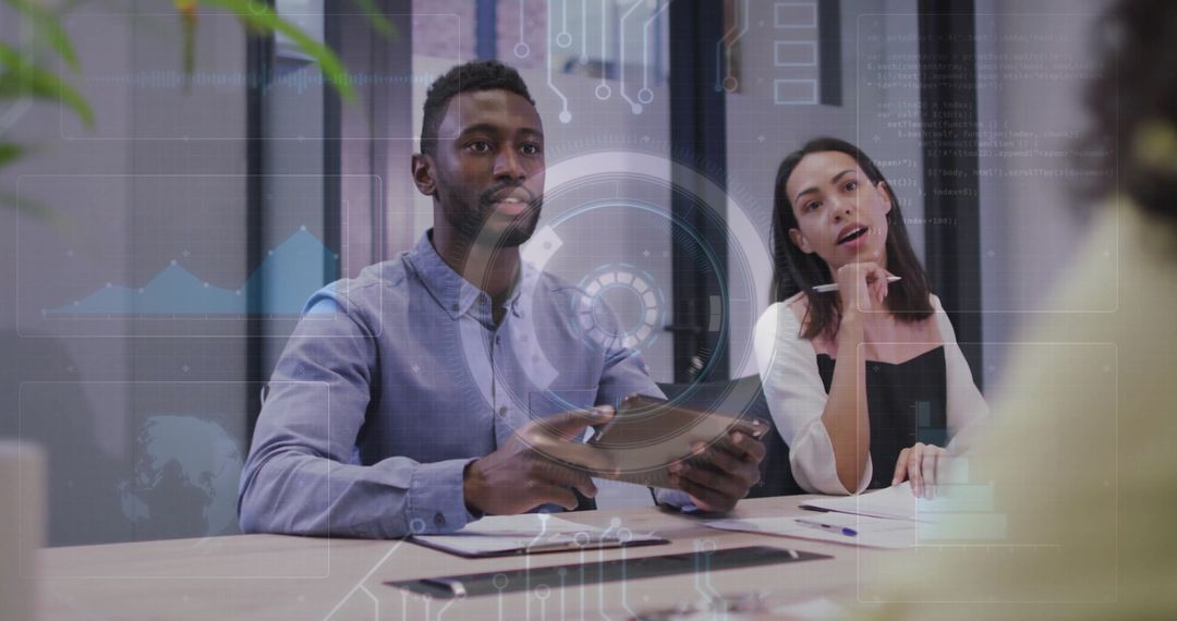 Diverse Professionals Discuss Data Visualizations in Modern Office