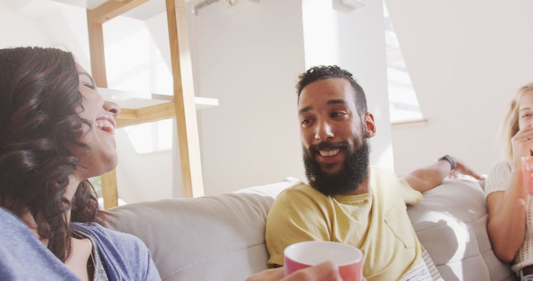 Diverse Friends Enjoying Weekend Get-together at Home