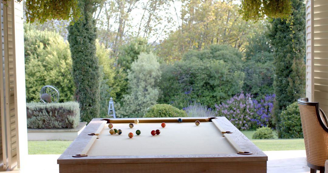 Scenic View of Billiard Table by Open Window with Sunlight