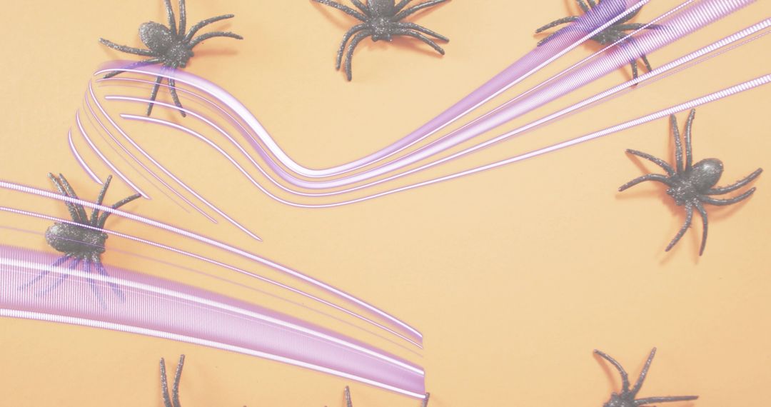 Lavender Ribbons Sweeping Across Peach Backdrop with Black Glitter Spiders for Halloween