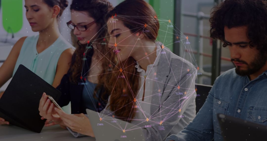 Team Collaborating with Digital Network Graphic Overlay