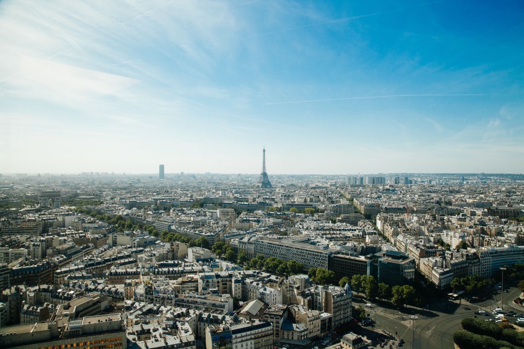 Panoramic View of Paris Skyline with Eiffel Tower on Sunny Day - Free Images, Stock Photos and Pictures on Pikwizard.com