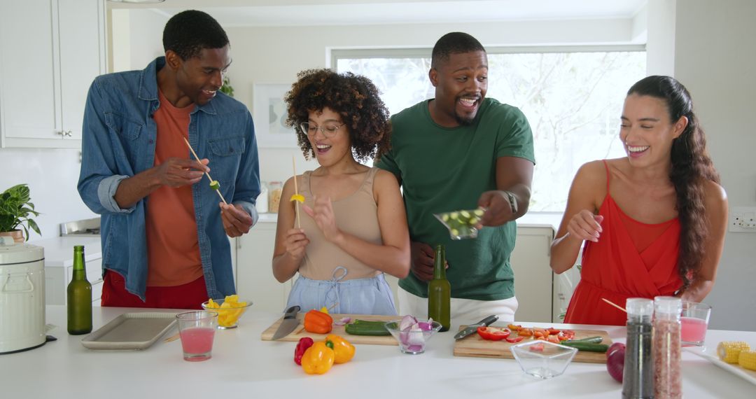 Diverse Group Enjoying Cooking Together with Fresh Vegetables