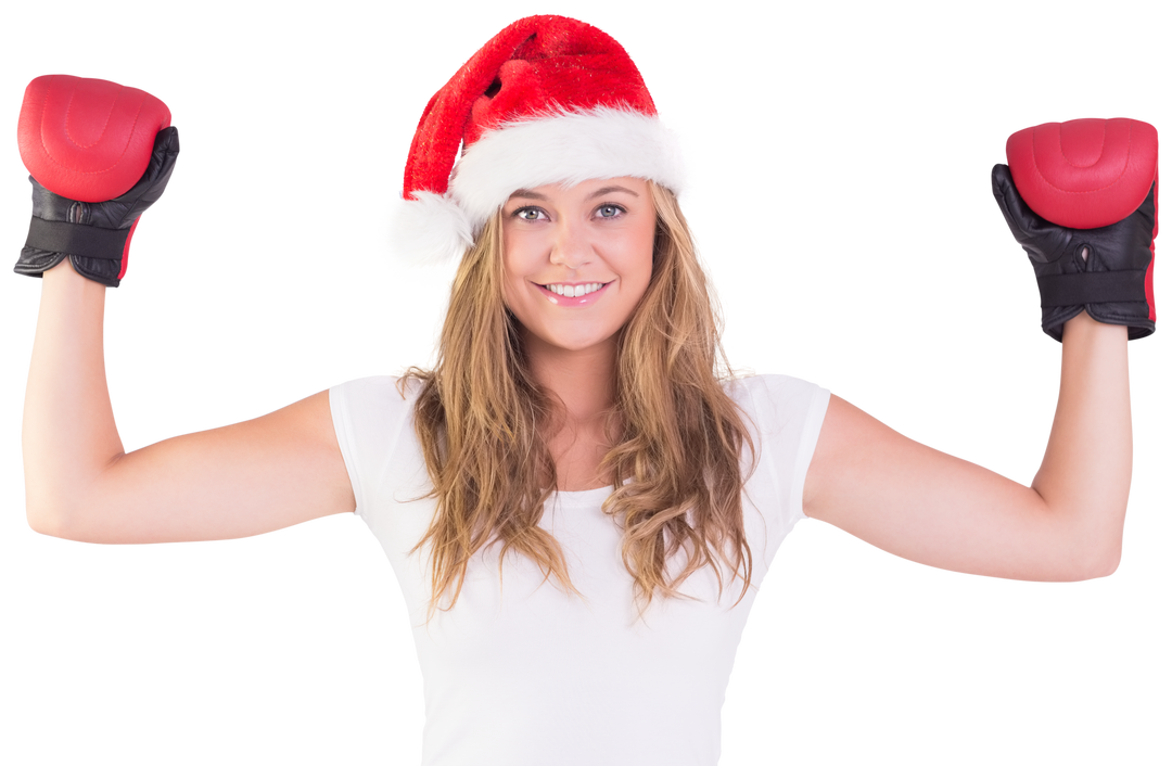 Festive blonde wearing red Santa hat and boxing gloves on transparent background - Download Free Stock Images Pikwizard.com