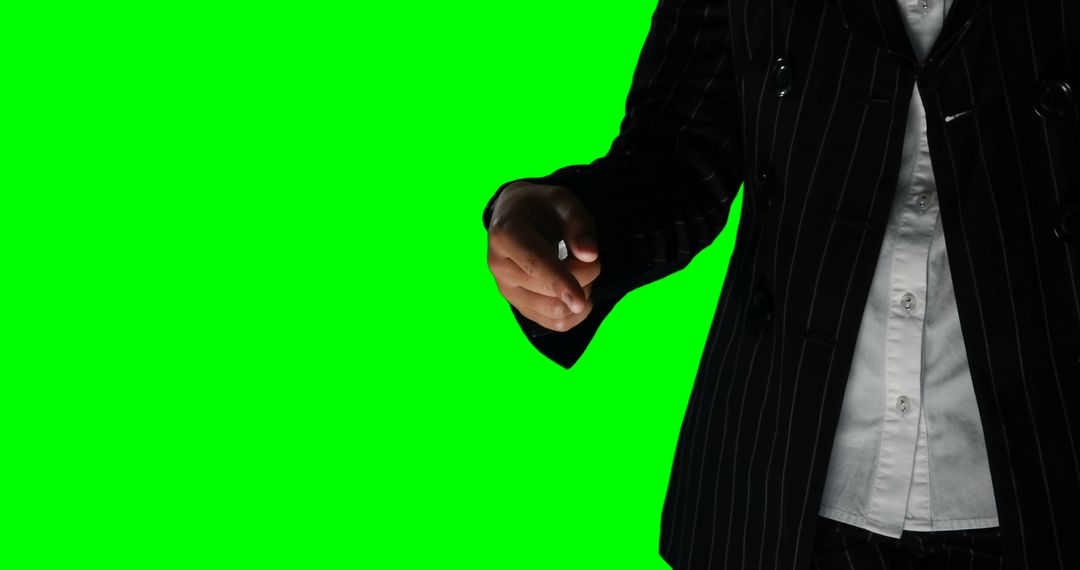 Businessperson in Suit Pointing at Camera on Green Screen Background - Free Images, Stock Photos and Pictures on Pikwizard.com