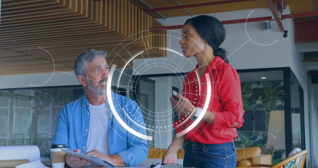 Diverse Professionals Engaging in Modern Digital Office Setting