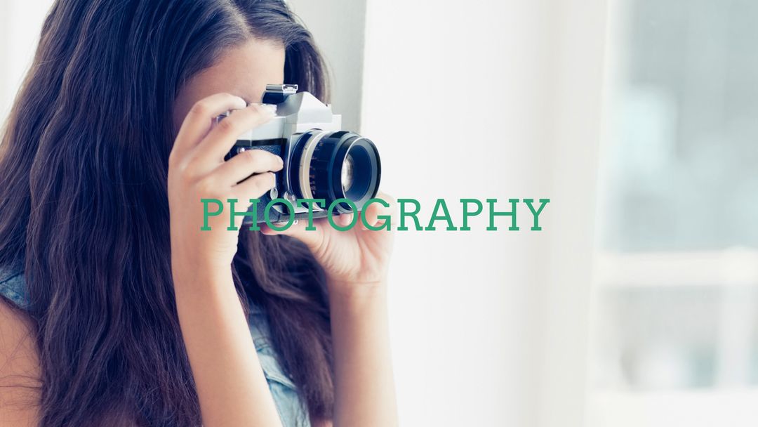 Woman Enjoying Photography with Camera Indoors - Download Free Stock Templates Pikwizard.com