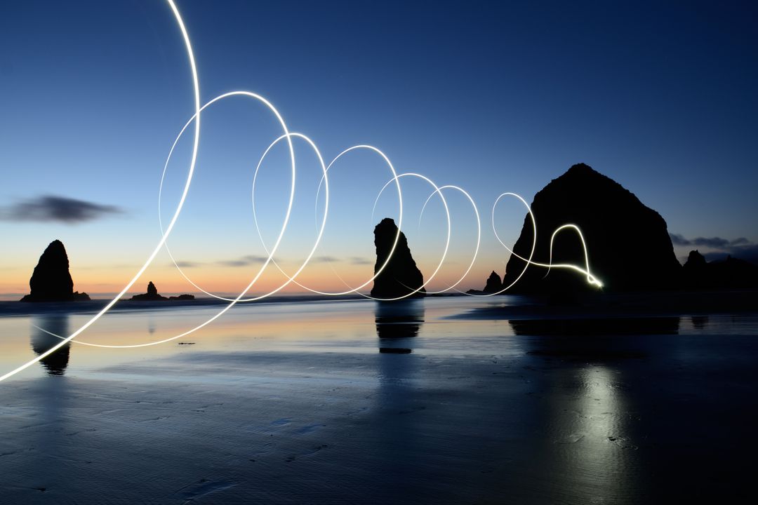 Surreal Long Exposure Light Trails on Ocean Sunset - Free Images, Stock Photos and Pictures on Pikwizard.com