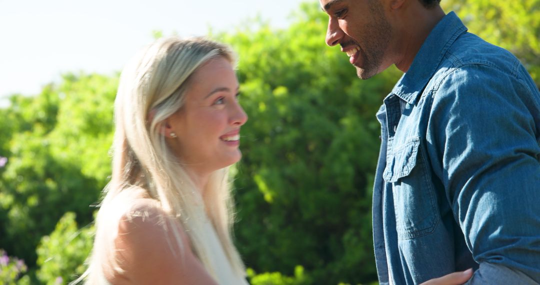 Joyful Proposal in Sunlit Garden