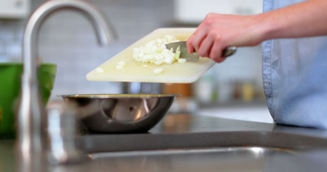 Man Chopping Vegetables in Modern Kitchen for Meal Prep