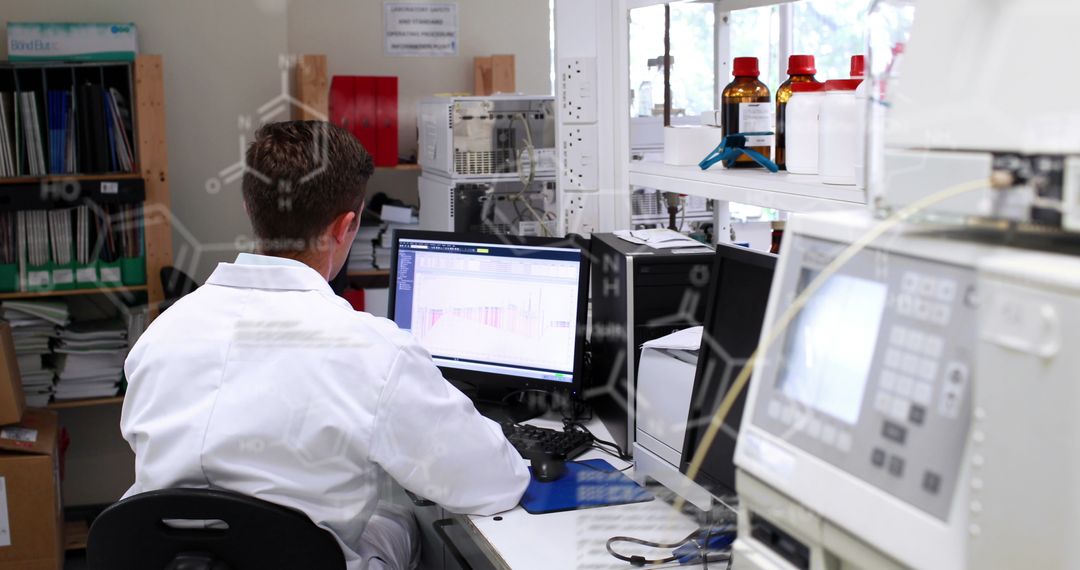 Scientist Analyzing Data in Laboratory