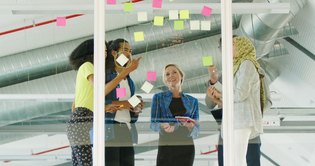 Diverse Team Collaborating in Modern Office on Creative Ideas