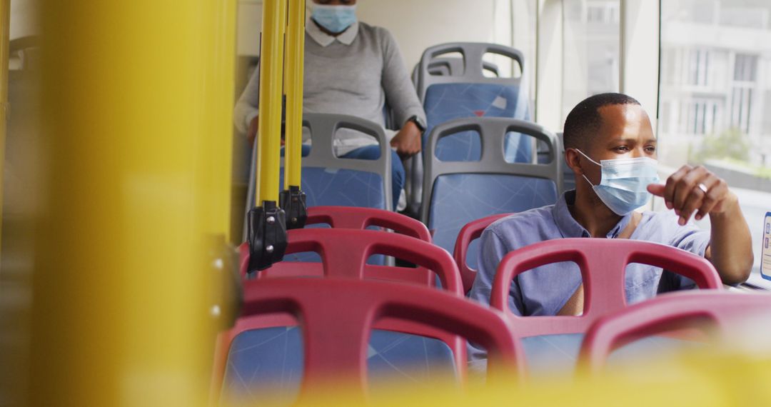 Commuters Wearing Masks on Public Bus During Pandemic
