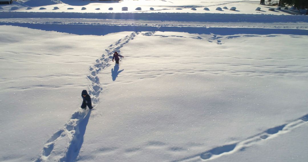 Kids Adventuring Through Pristine Snowy Wilderness