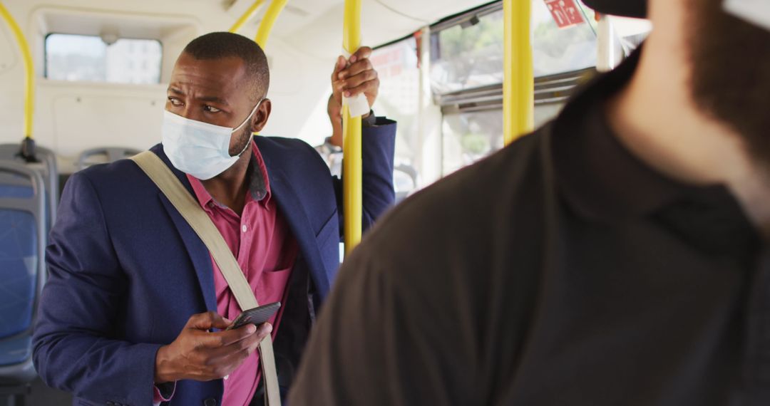 Businessman in City Bus Wearing Face Mask Using Smartphone