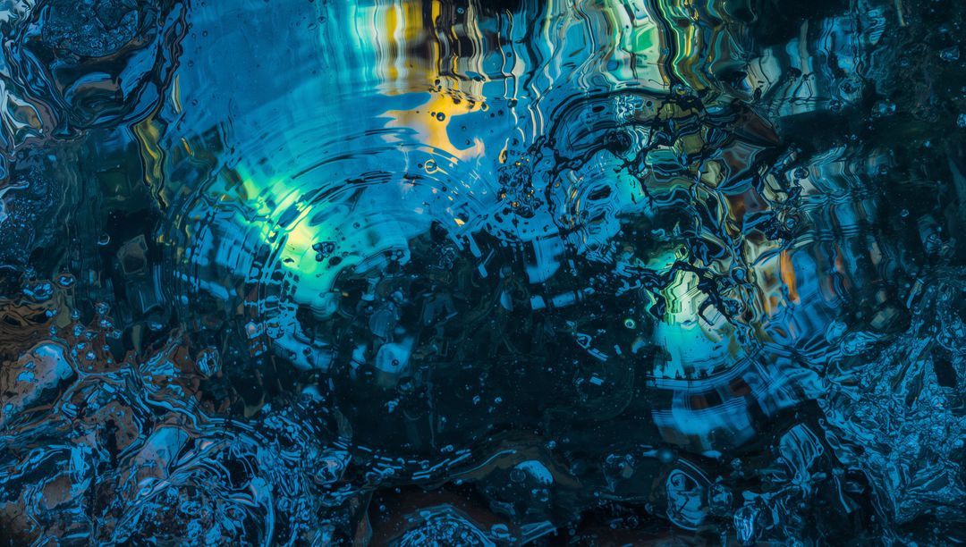 Iridescent Rippling Water Surface with Neon Circular Ripples and Glassy Reflections