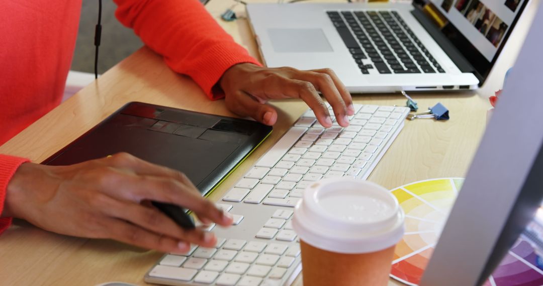 Fashion Designer Working with Graphic Tablet and Computer