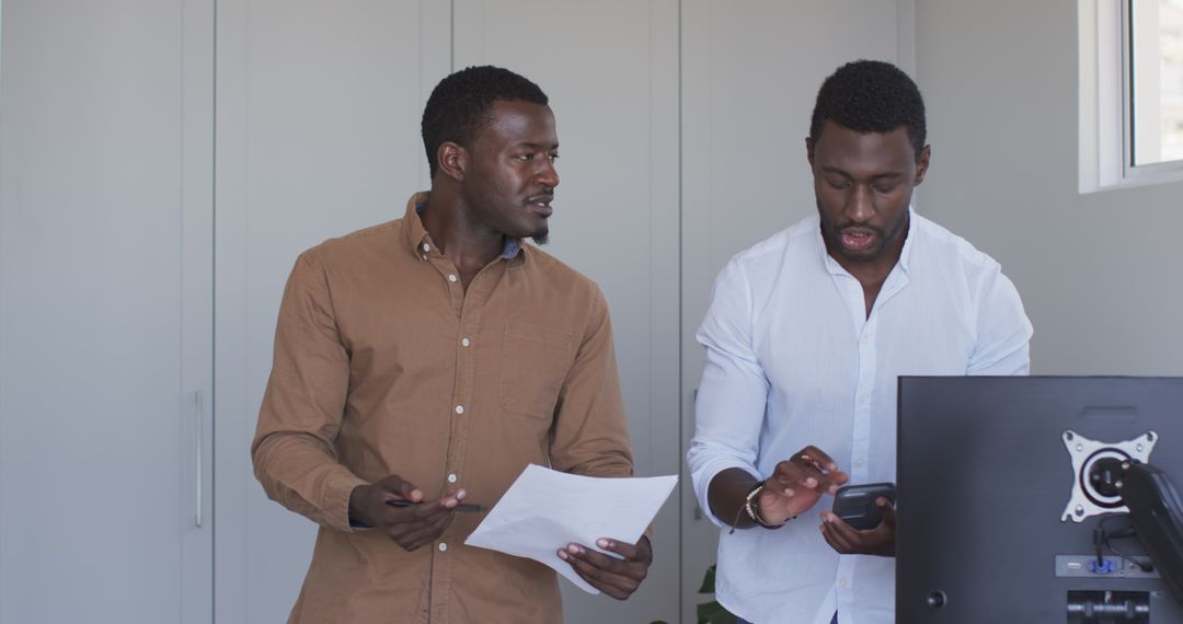 Business Colleagues Collaborating in a Modern Office Setting